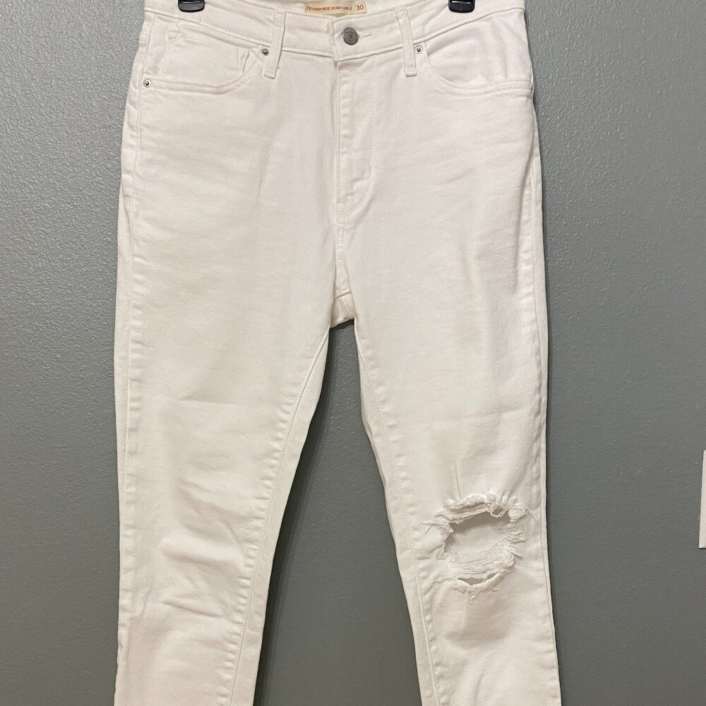 Levi Strauss white 721 Hi-rise ankle raw hem distressed jeans.